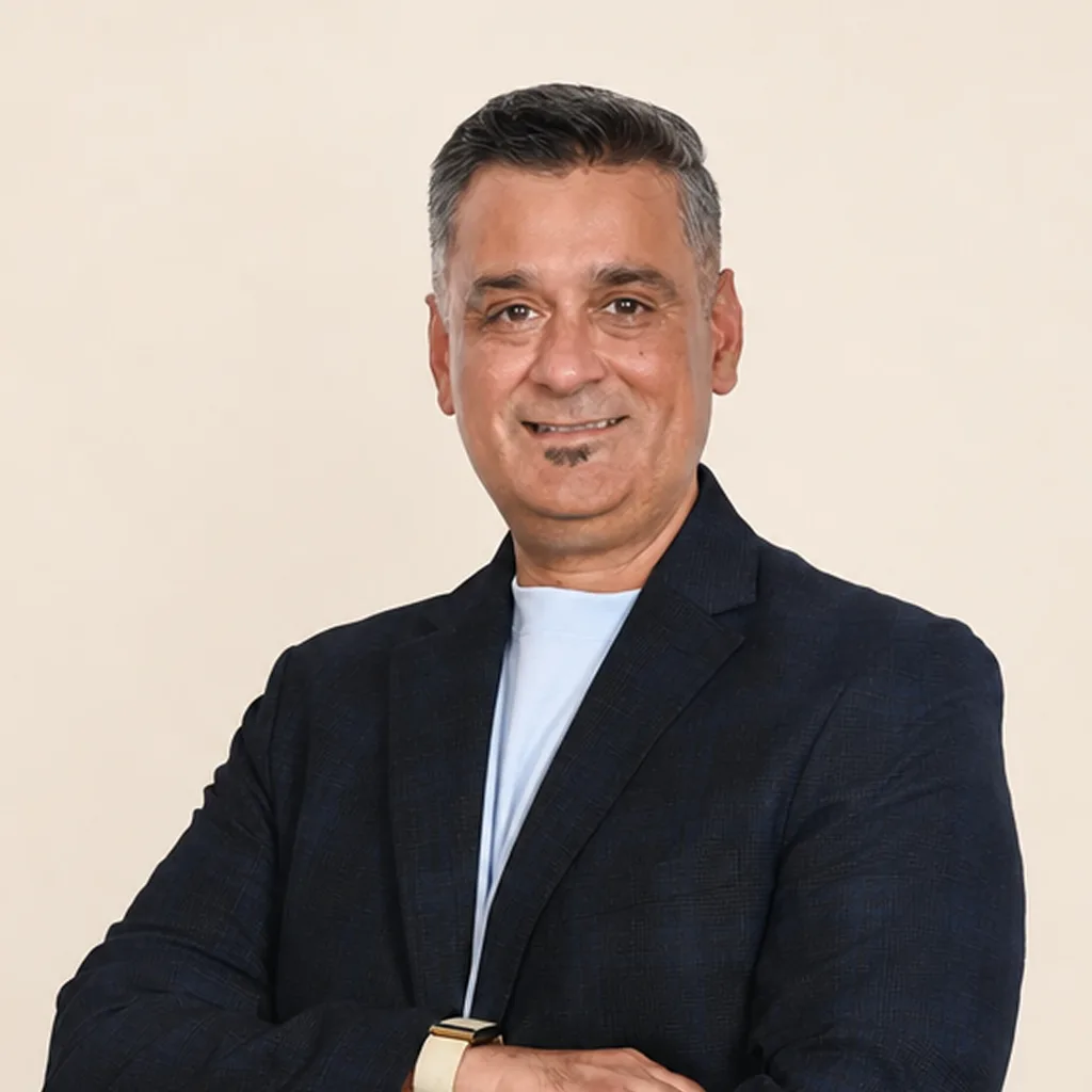 Portrait of Milan Bhatt, CEO and Executive Director