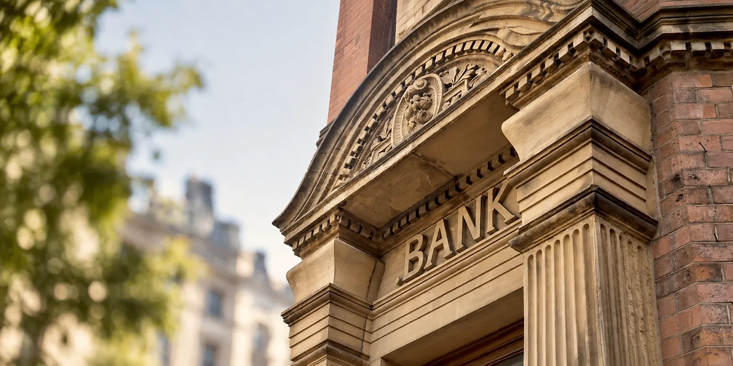 Historic bank facade in warm sunlight